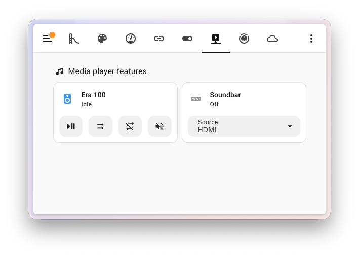 Screenshot of a media player tile card showing the new mute, shuffle, repeat, and volume controls together with a filtered source dropdown.