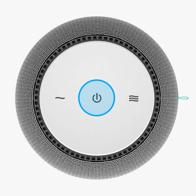 Top down view of a SNOOZ White Noise Machine, highlighting the power button.